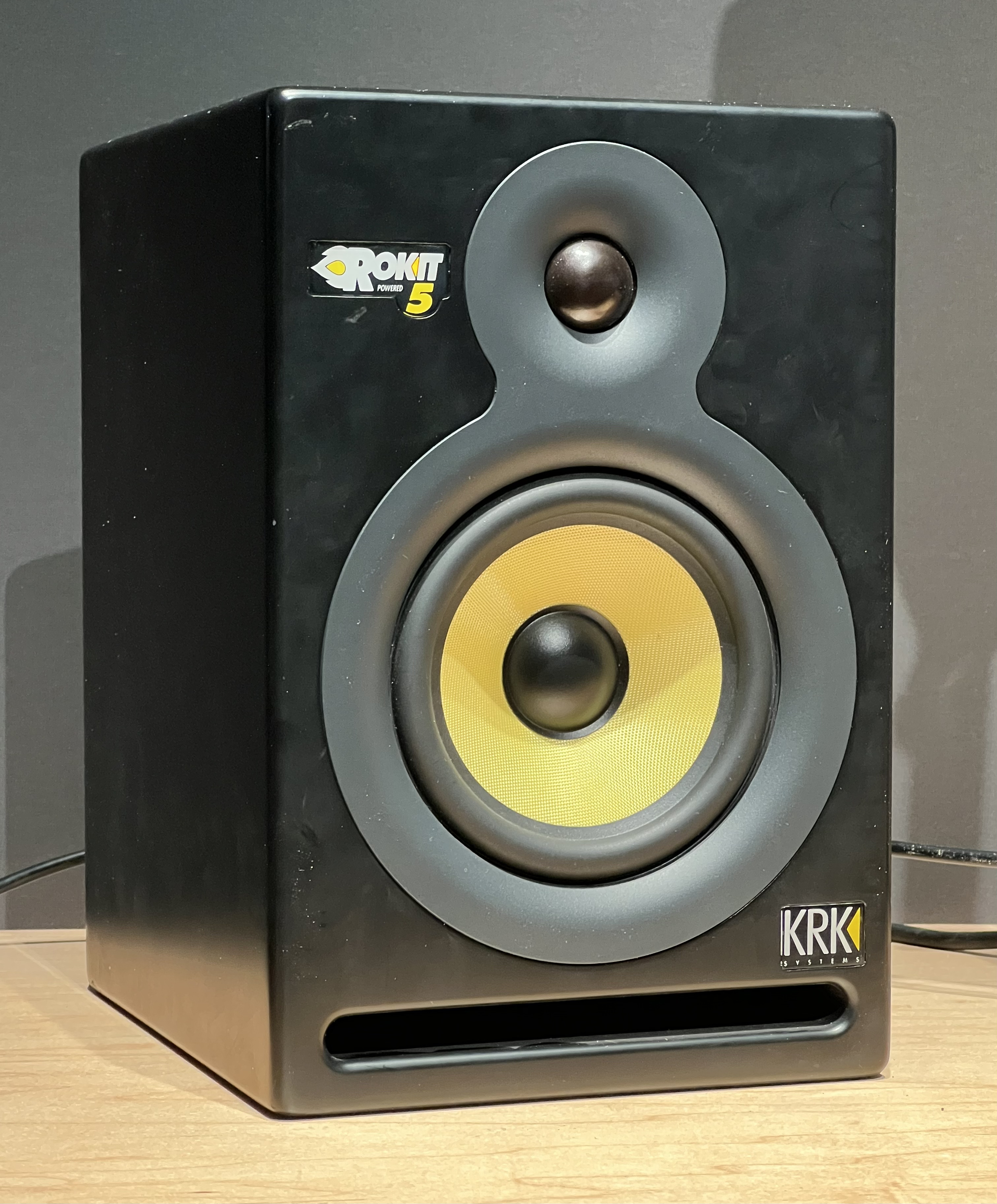 KRK ROKIT 5 powered studio monitor with yellow Kevlar woofer